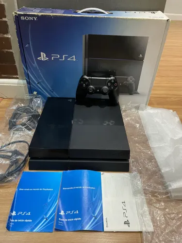 PS4 Fat 500gb na caixa com vários jogos