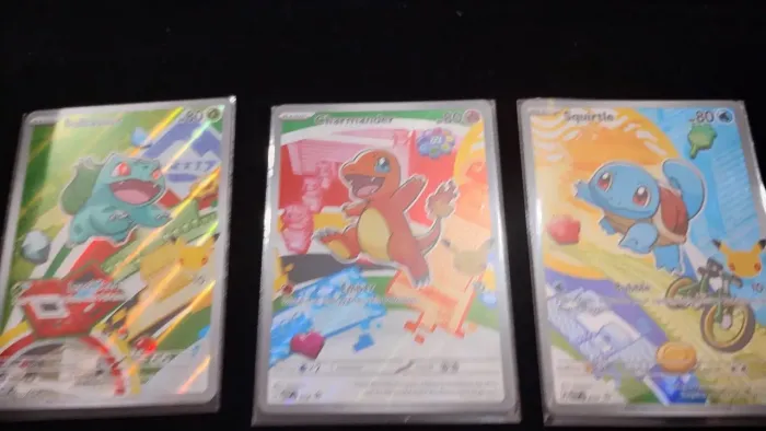 Três cartas Pokémon
