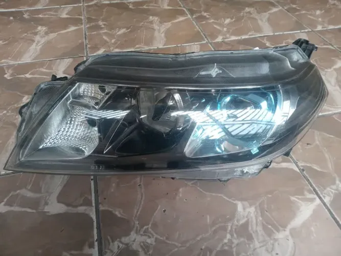 Farol Esquerdo Suzuki grand Vitara friso azul (pra recuperar)