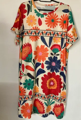 Lindo vestido floral XL de malha fria novo sem uso.