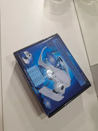Óculos profissional com iluminação e lentes de aumento na cor branca