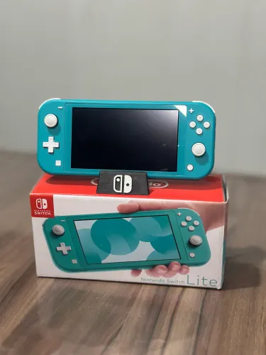VALOR NEGOCIAVEL!! VENDO OU TROCO NINTENDO SWITCH LITE DESBLOQUEADO POR CAMERA FOTOGRAFICA