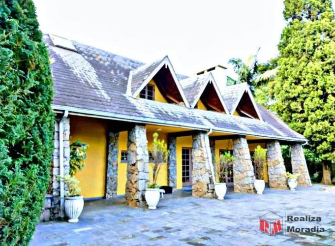 Condomínio Gramado - Casa com 3 dormitórios à venda, 350 m² por R$ 1.600.000 - Gramado - C