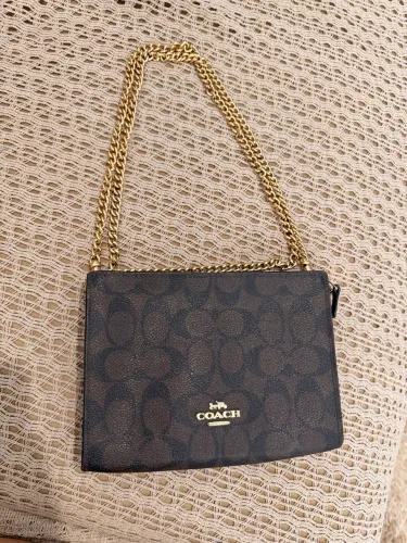 Bolsa coach pouco usada 