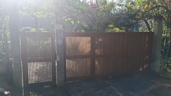 Portão ripado em Peroba Rosa