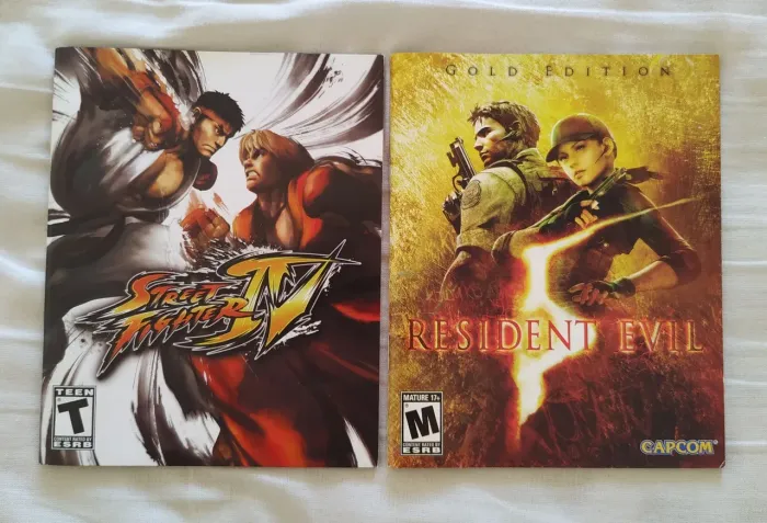 Resident Evil 5 e Street Fighter IV - Manuais originais