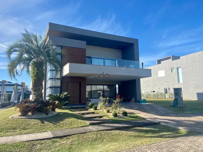 Casa mobiliada beira lago com piscina e 05 dormitórios à venda - Condomínio Capão Ilhas Re