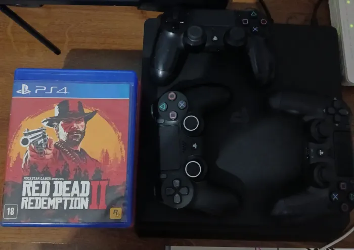 Playstation 4 + 7 jogos + 3 controles originais