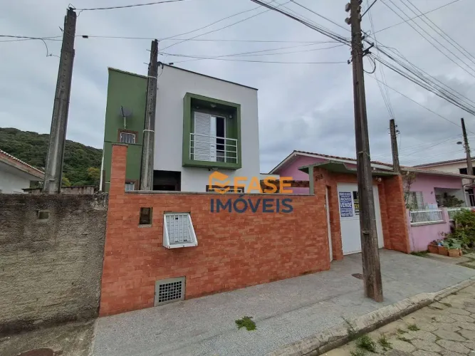 Casa com 3 dormitórios à venda, 119 m² por R$ 490.000,00 - Campo de Fora - Laguna/SC