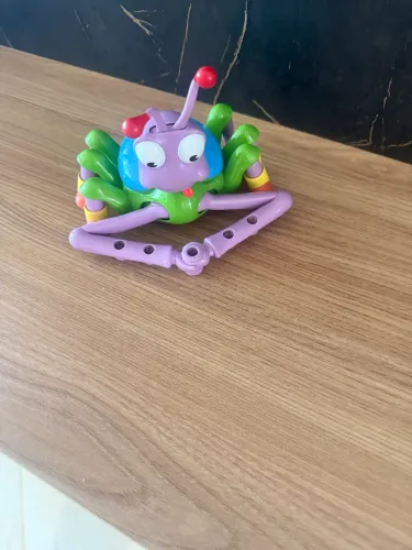 Visão geral criada por IA  Este brinquedo é o Espirogrillo da marca Dican