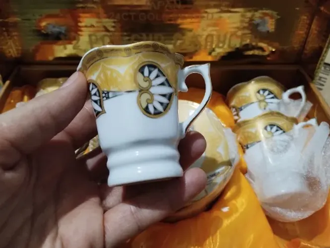 Jogo xícara e pires de porcelana