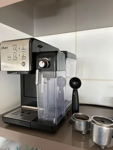 Cafeteira Oster Prima latte 110
