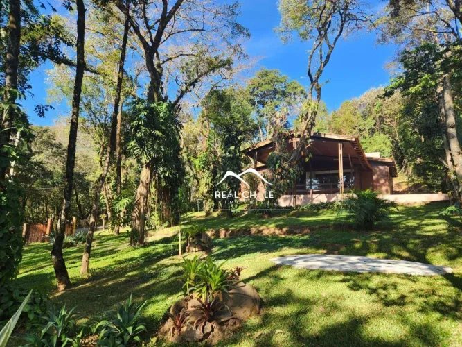 Casa com 3 dormitórios à venda, 200 m² por R$ 1.490.000,00 - Condomínio Retiro do Chalé -