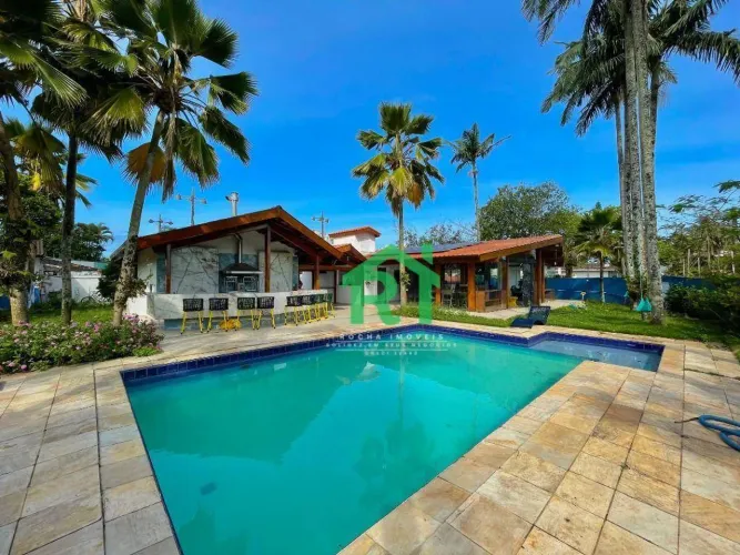 Casa com 3 quartos (3 suítes), 4 vagas e lazer à venda em Enseada, Guarujá