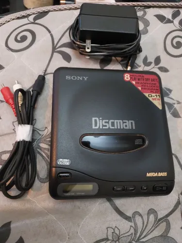 Discando Sony D11. Com fonte original e cabo para ligar rca funcionando perfeitamente. 