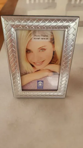 Porta retrato de aluminio e veludo atras