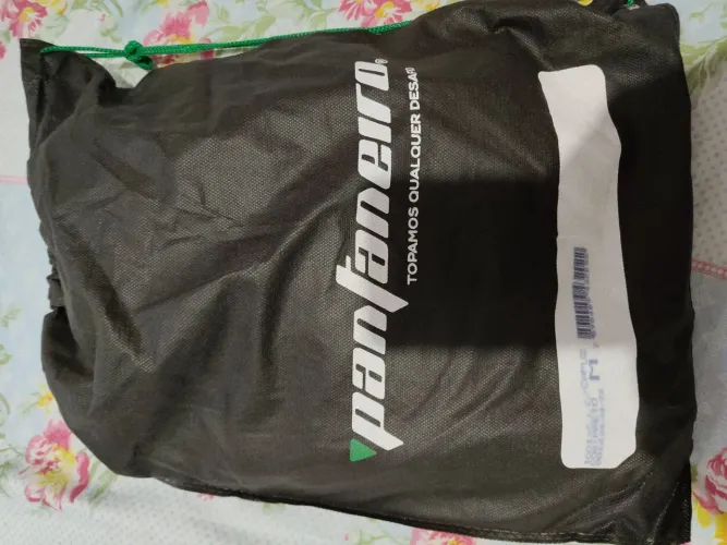 Capa para motoqueiro uma G e uma M