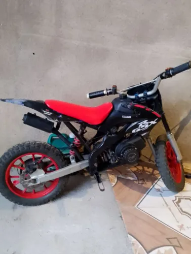 Mini moto Cross top moto excelente pra criança vendo ou troco 
