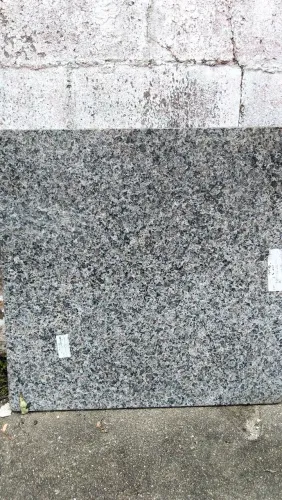 Tampo de granito
