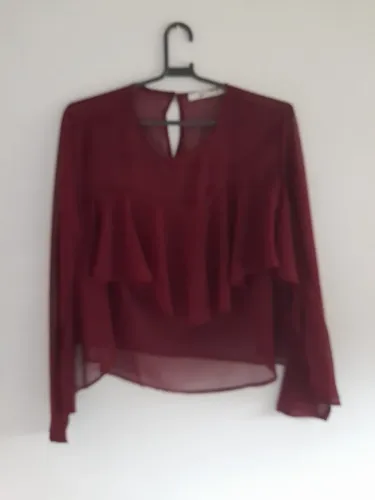 Blusas 50,00 cada