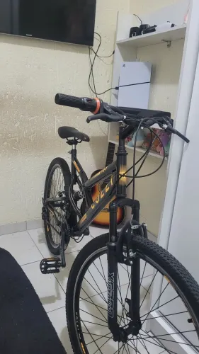 Vendo bicicleta colli aro 26 full suspension. Nova!!