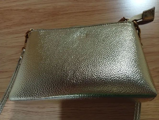 Bolsa Santa Lolla dourada