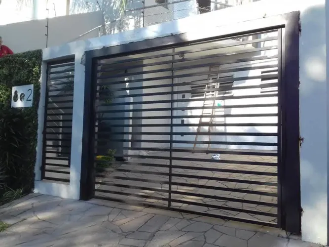Fabricação,Conserto de Portões Variados,Cortinas Automáticas.
