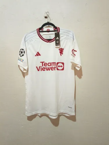 Camisa do Manchester United away 23, G