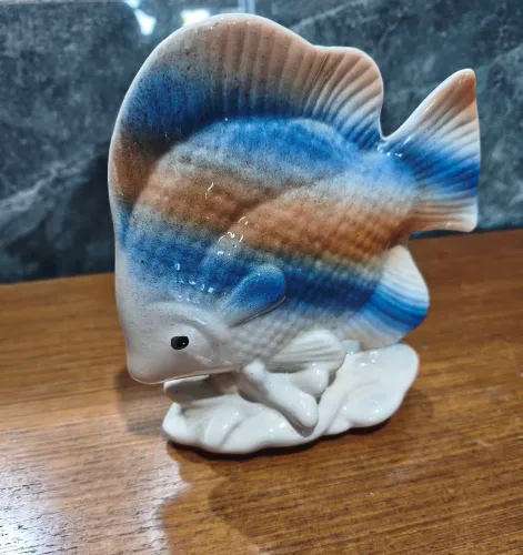 Antiga escultura Peixe