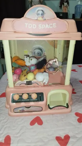 Máquina de pegar brinquedos e mini ursinhos