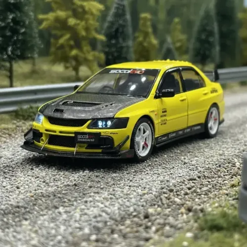 Lancer Evolution IX 1:24 amarelo - som e luz