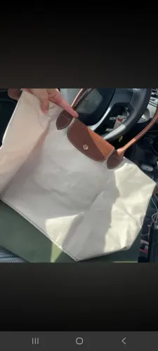 Bolsa da Longchamp Paris comprada na loja verdadeira bolsa original semi nova 1400$