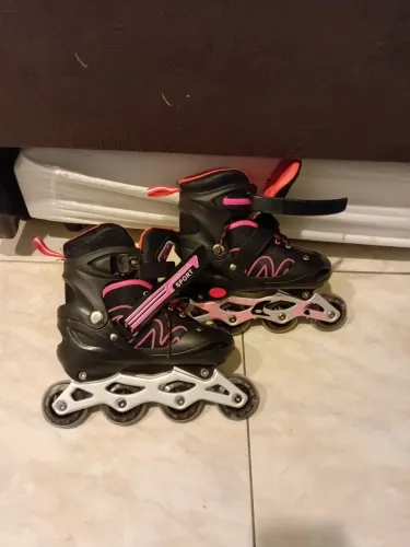 Patins rosa e preto, tamanho 35 nunca usado com a bolsinha original