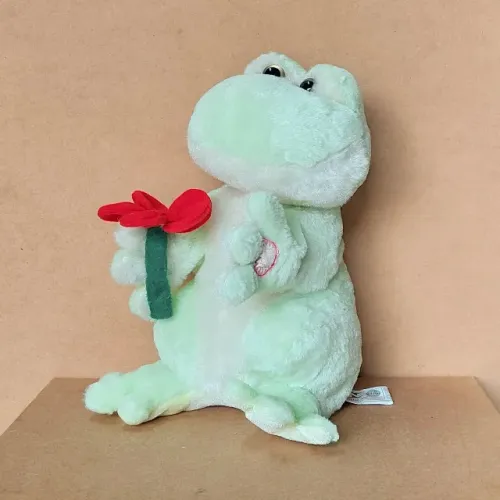 brinquedo - pelúcia sapo verde música (usado)