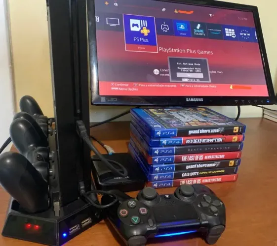 PS4 Slim 500GB + 2 controles + 7 jogos + base carregadora