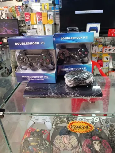 PS3 slim revisado completo 2 controles garantia 10 jogos na memória Hem ativado garantia