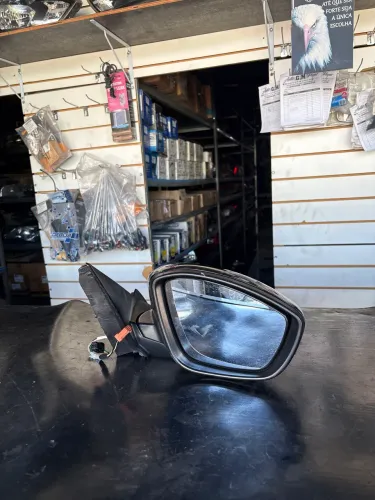 Retrovisor Peugeot 208 lado direito 22/24