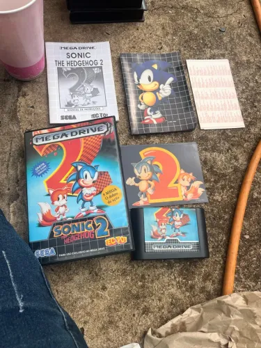 Vendo jogo de mega drive sonic com adesivo original manual na caixa