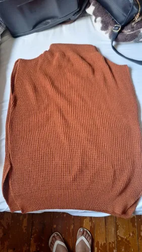 colete de tricô gola role
