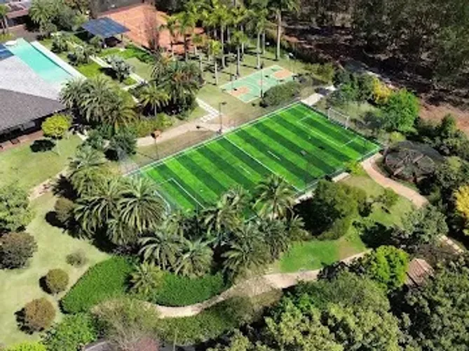 Manutenção de campo de futebol society 