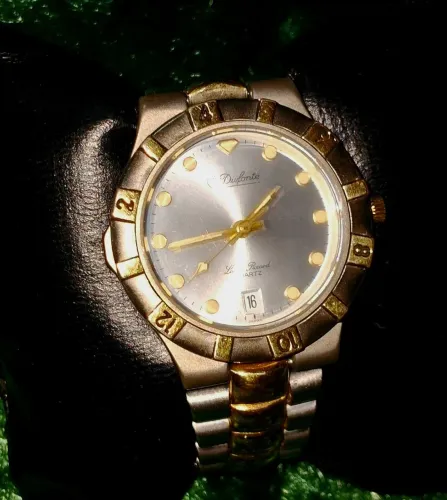 RELÓGIO SUÍÇO LUCIEN PICCARD,  TODO EM AÇO INOX, COM DETALHES OURO, MERGULHO 5ATM.