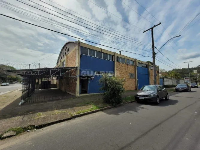 Pavilhão comercial de 600 m² com depósito e 15 salas para alugar em Porto Alegre