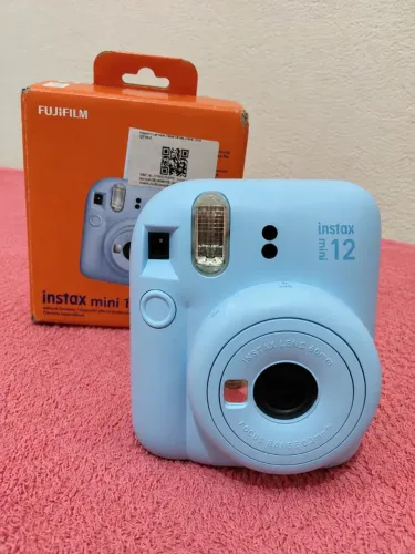 Câmera instax mini 12 com 5 filmes /seminovo