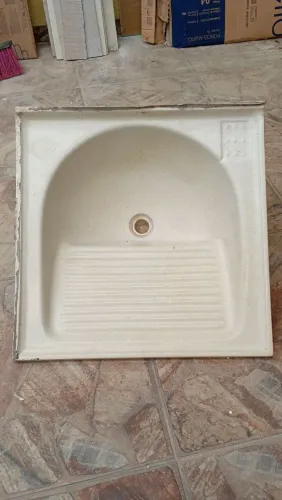Tanque lavanderia de cerâmica sintética.
