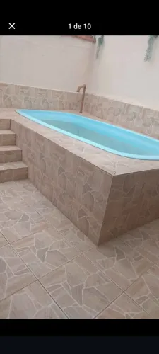 Casa com piscina Praia grande - SP jardim Real 