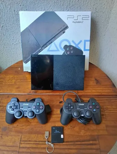 Ps2 na caixa + 2 controles + 4 mil jogos