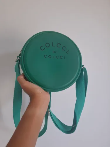 Bolsa verde redonda . Usada