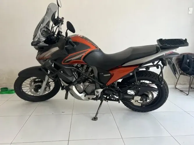 Moto bem conversada, sem pendências, pronta pra ser transferida, moto quitada ?