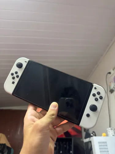 Nintendo switch Oled, 64gb + cartão de 128 gb + case e película