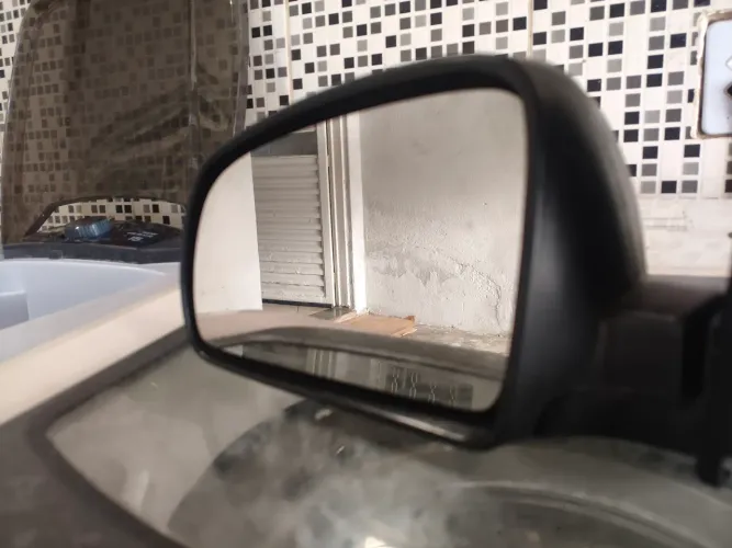 Retrovisor celta lado motorista 